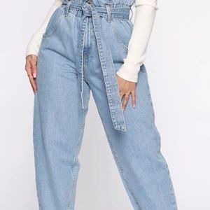 Light blue jeans with belt